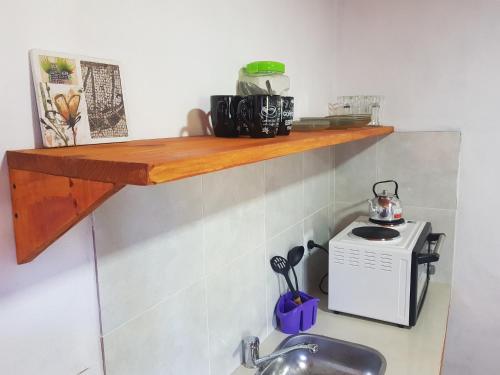 Η κουζίνα ή μικρή κουζίνα στο Casas de Raco