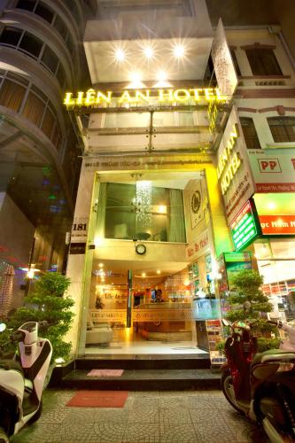 a store front of a store with a sign on it at Lien An Sai Gon Hotel in Ho Chi Minh City