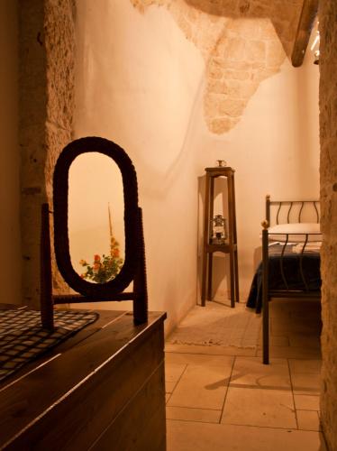 Postel nebo postele na pokoji v ubytování Giardino Dei Trulli