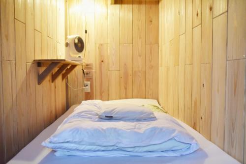 Ένα ή περισσότερα κρεβάτια σε δωμάτιο στο Guesthouse Asibina