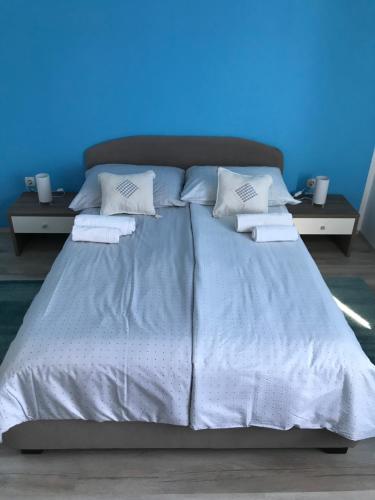 Postel nebo postele na pokoji v ubytování Apartments Lena
