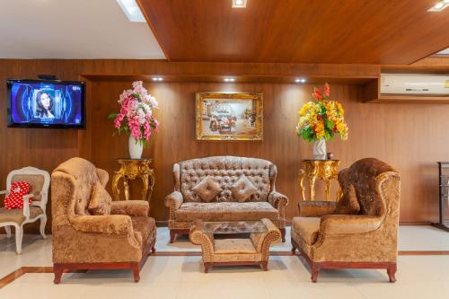 Area soggiorno di The Airport Greenery Hotel