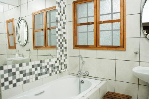 Kylpyhuone majoituspaikassa De Bruine Huis