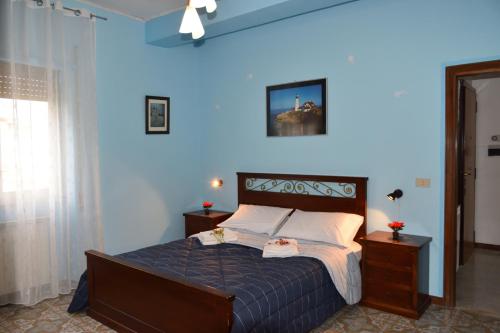 Postel nebo postele na pokoji v ubytování Vacanze dai Re