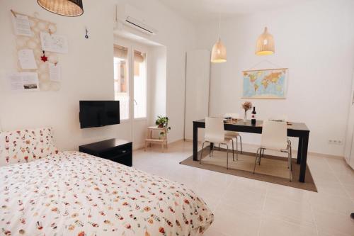 Posteľ alebo postele v izbe v ubytovaní Amparito Apartment - Casc Antic