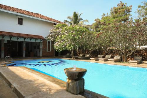 Piscina a Villa Araliya o a prop