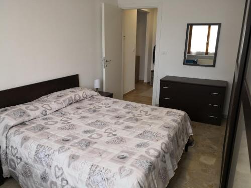 מיטה או מיטות בחדר ב-Casa di Giusy al mare
