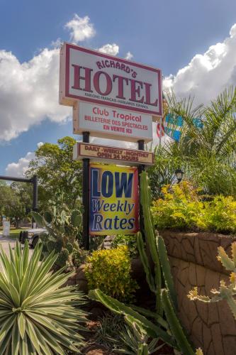 a sign for a hotel with many signs at Richard's Hotel in Hollywood