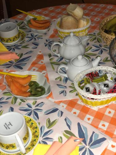 a table with plates and bowls of food on it at La marina in Cagliari
