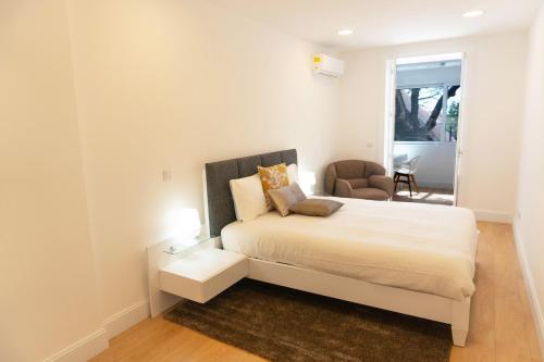 Postel nebo postele na pokoji v ubytování Finest Rentals - Downtown Villa
