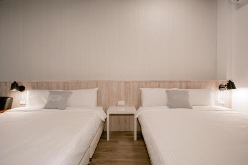 Postel nebo postele na pokoji v ubytování Starrywhale hostel
