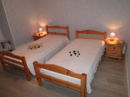 Posteľ alebo postele v izbe v ubytovaní GITE DES ROCHES