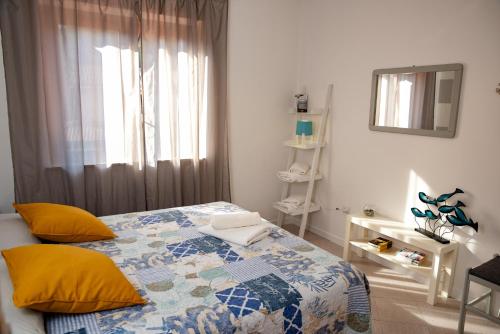 Letto o letti in una camera di Villa Porto Ada Residence