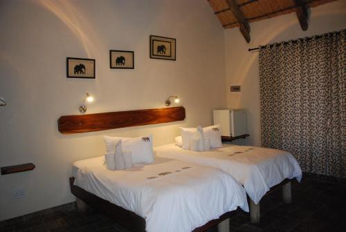 Postel nebo postele na pokoji v ubytování Oppi-Koppi Rest Camp