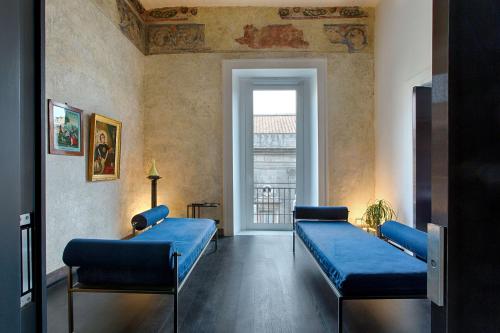Area soggiorno di Tutt 'e Sant Luxury Rooms