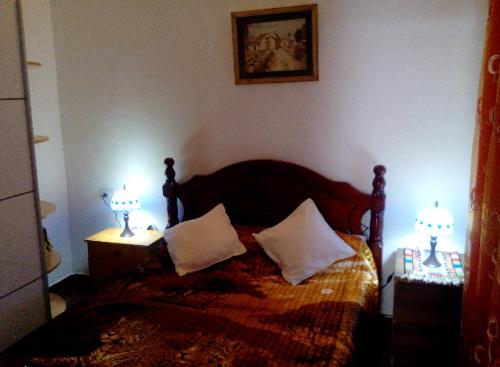 เตียงในห้องที่ A cozy flat in the heart of El Fraile
