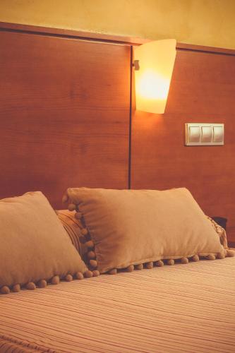 Hotel MIRAVALLEにあるベッド