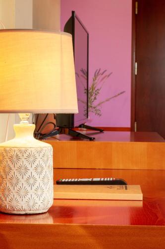 Hotel MIRAVALLEにあるテレビまたはエンターテインメントセンター