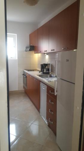 Kuchyň nebo kuchyňský kout v ubytování Apartments Villa Marija
