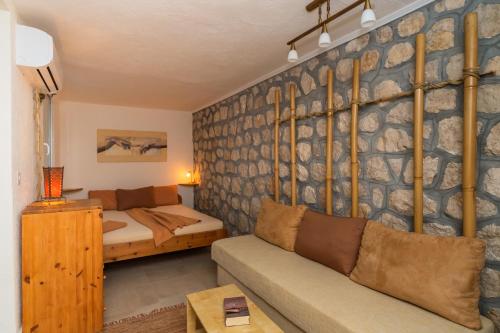 Ένα ή περισσότερα κρεβάτια σε δωμάτιο στο Apartments Mirian