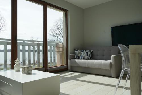Posedenie v ubytovaní Apartament Nadjeziorna