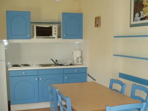 Dapur atau dapur kecil di Lagrange Vacances Les Mazets de Gaujac