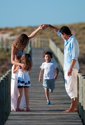a group of people walking on a bridge at Vila Gale Alentejo Vineyard - Clube de Campo in Albernoa