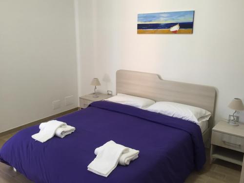 Katil atau katil-katil dalam bilik di Il Viaggiatore Via Rimini Serapo
