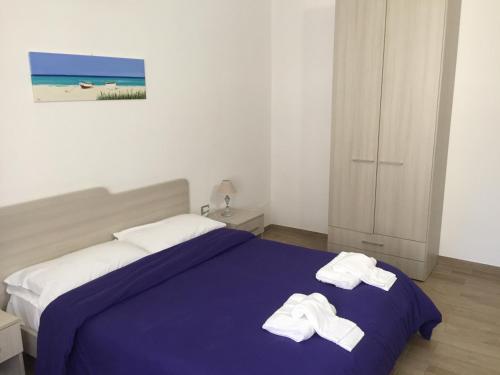 Katil atau katil-katil dalam bilik di Il Viaggiatore Via Rimini Serapo