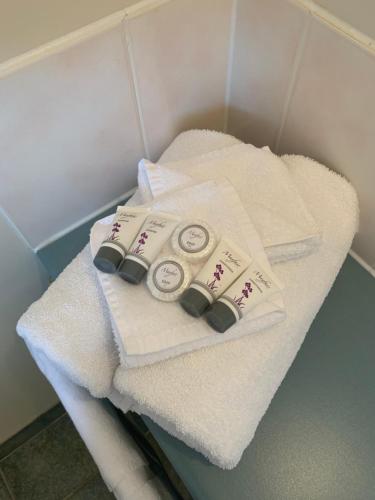 two towels sitting on a shelf in a bathroom at Arthur Phillip Motor Inn in Cowes