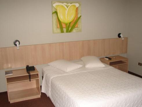 Katil atau katil-katil dalam bilik di Muchiutt Park Hotel