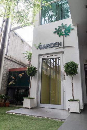 a building with a sign that reads garden at V Garden Hotel in Kuala Lumpur
