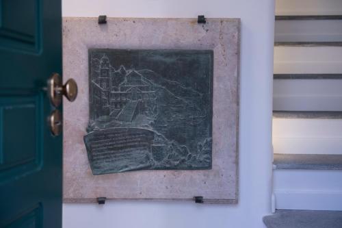 a picture of a painting on a door at Zia Pupetta Suites in Amalfi