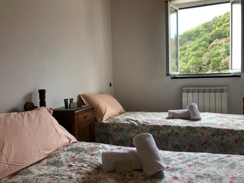 Llit o llits en una habitació de Villa Teca & Succo - Nature e Relax