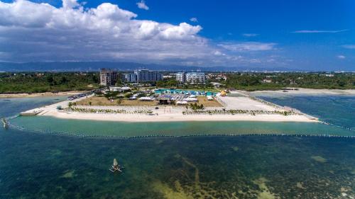 an aerial view of an island in the ocean at Solea Mactan Resort in Mactan