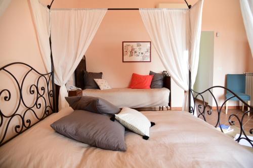 Katil atau katil-katil dalam bilik di Giardino Arancio