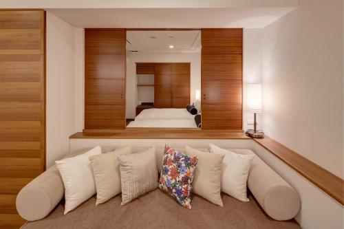 Una cama o camas en una habitación de Ala Mahaina Condo Hotel