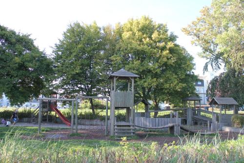 a playground in a park with a slide at Sonnengarten 19 in Kellenhusen