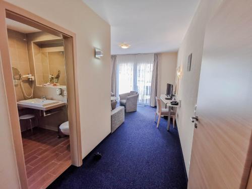 Koupelna v ubytování Wald-Hotel