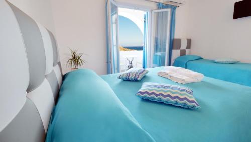 Ein Bett oder Betten in einem Zimmer der Unterkunft Artemis Village