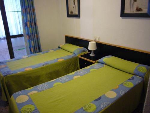 Cama ou camas em um quarto em Islandia - Fincas Arena