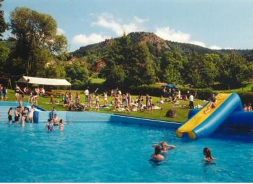 a group of people in the water at a water park at Gästehaus Sonne in Gernsbach