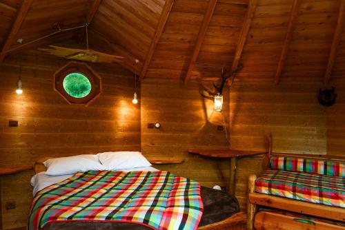 Postel nebo postele na pokoji v ubytování Logis Hôtel Andreinia & Cabanes