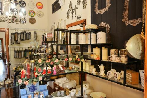 a store with a lot of items on display at Die Kliphuis in Standerton