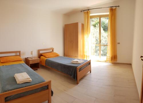 Posteľ alebo postele v izbe v ubytovaní Marea Retreat Apartments