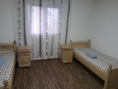 Postel nebo postele na pokoji v ubytování Vučeljić rooms