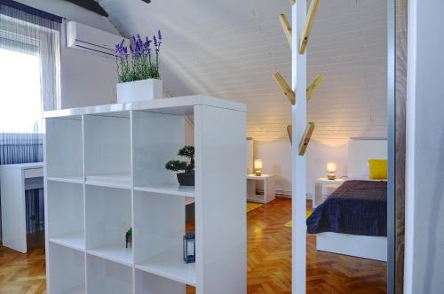 Posteľ alebo postele v izbe v ubytovaní Apartman studio SONAS 3 with free private parking