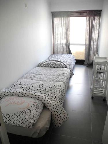 Letto o letti in una camera di Duong condo