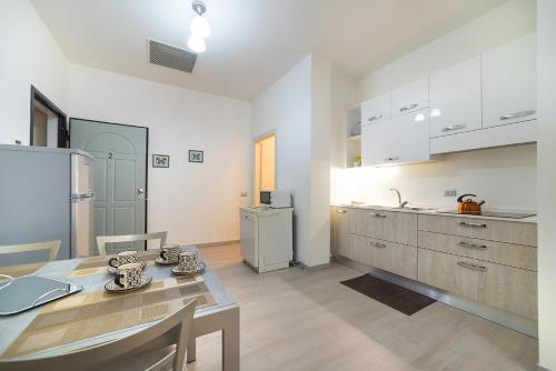 Cuisine ou kitchenette dans l'établissement Dimore Verona