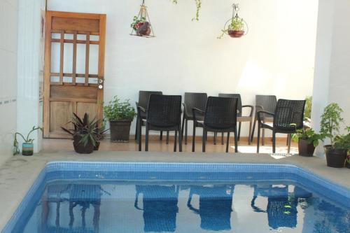 A piscina localizada em LALORA Hotel & Villas ou nos arredores